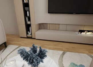 Zabudowa ściany z kominkiem i TV w salonie. Jak połączyć te dwa elementy? Nowoczesny salon z kominkiem i minimalistycznym wystrojem